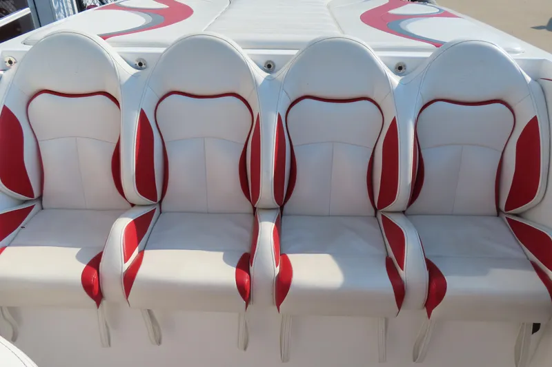 Slide: The Image of 2013 Nordic 39 POKER RUN boat seats, white and red design, four seats in a row. - 20