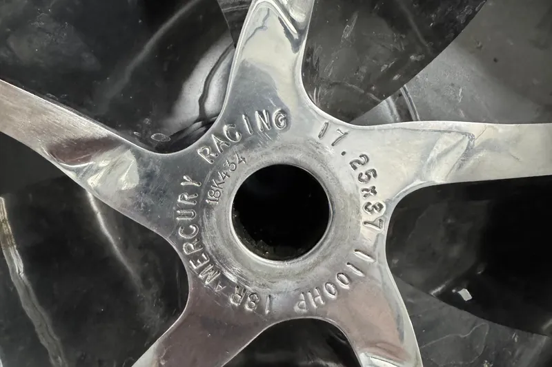 Slide: The Image of Close-up of a Mercury Racing propeller on a 2013 Nordic 39 Poker Run boat. - 12