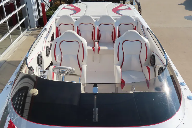 Slide: The Image of 2013 Nordic 39 POKER RUN boat interior with white and red seating, sleek design. - 6