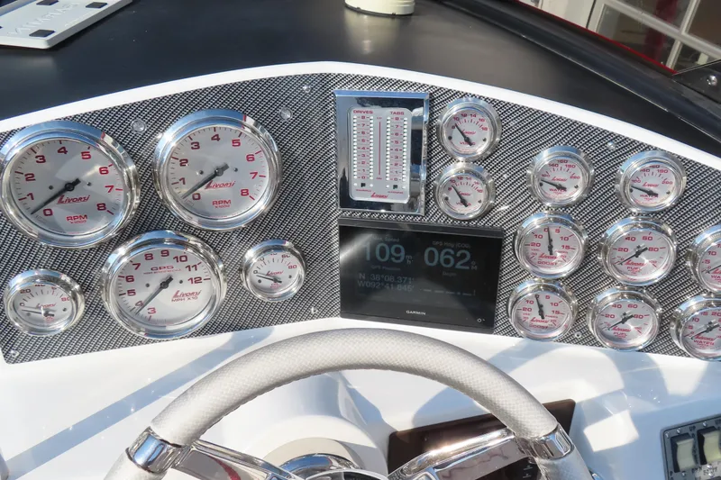 Slide: The Image of Dashboard of 2013 Nordic 39 POKER RUN boat with Livorsi gauges and Garmin display. - 22