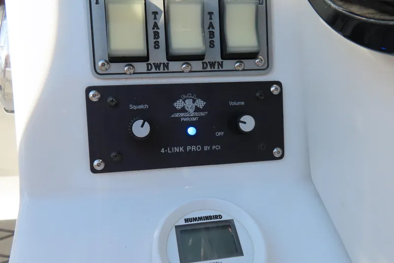 Slide: The Image of Control panel of a 2013 Nordic 39 POKER RUN boat with audio and tab controls. - 26