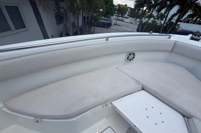 Slide: The Image of 2007 Robalo R260 Center Console boat interior with cushioned seating and speaker. - 35