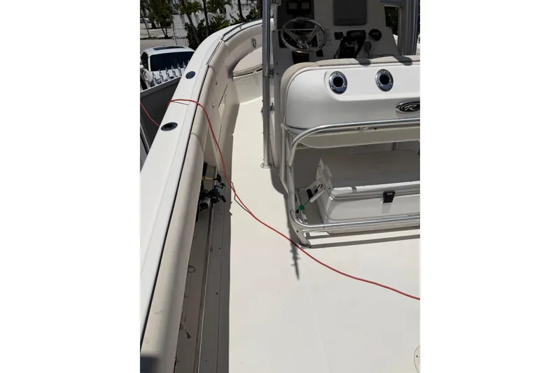 Slide: The Image of 2007 Robalo R260 Center Console boat interior with steering wheel and seating area. - 16