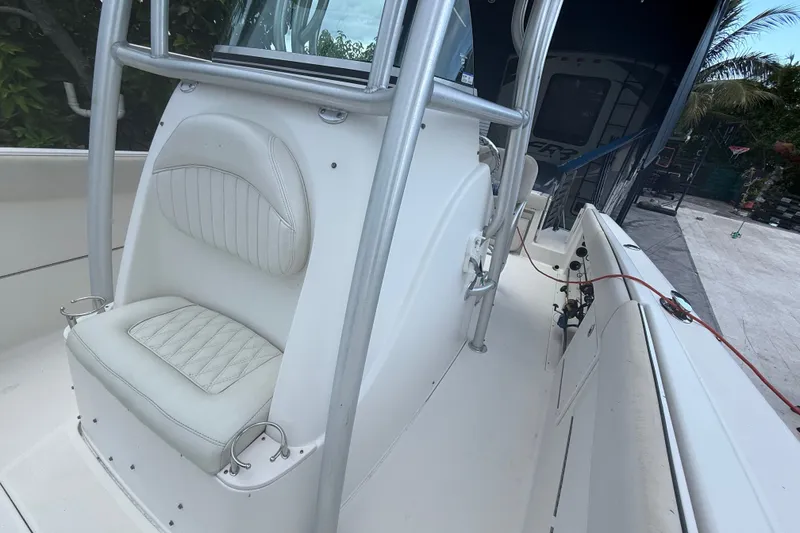 Slide: The Image of 2007 Robalo R260 Center Console boat interior with white seating and sturdy framework. - 44