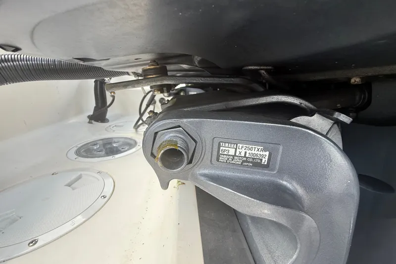 Slide: The Image of Close-up of Yamaha LF250TXR engine part on 2007 Robalo R260 Center Console boat. - 13