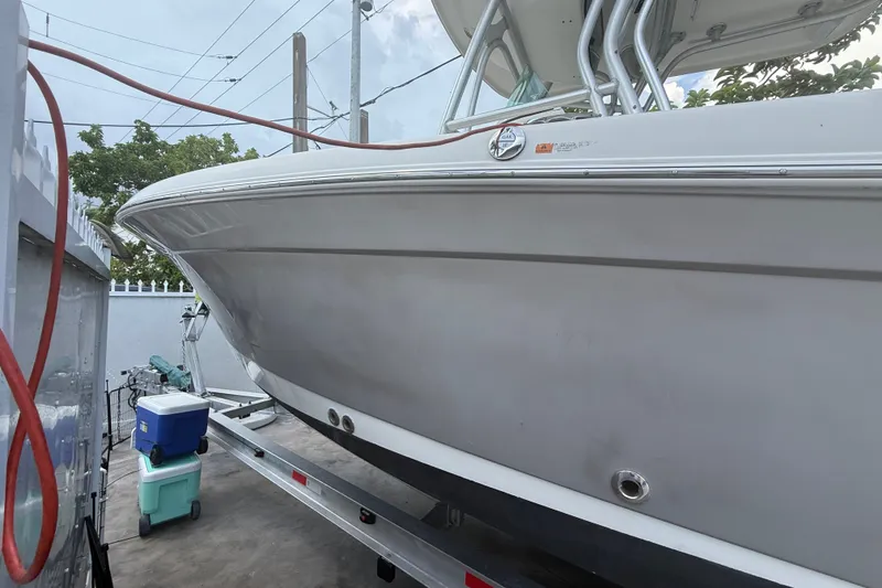 Slide: The Image of 2007 Robalo R260 Center Console boat on trailer, side view. - 5
