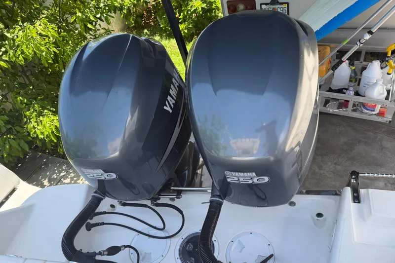 Slide: The Image of Twin Yamaha 250 engines on a 2007 Robalo R260 Center Console boat. - 17