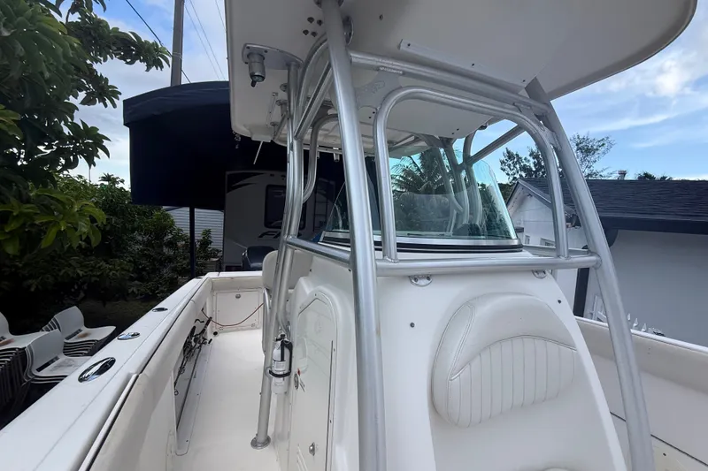 Slide: The Image of 2007 Robalo R260 Center Console boat with sleek design and sturdy T-top. - 43
