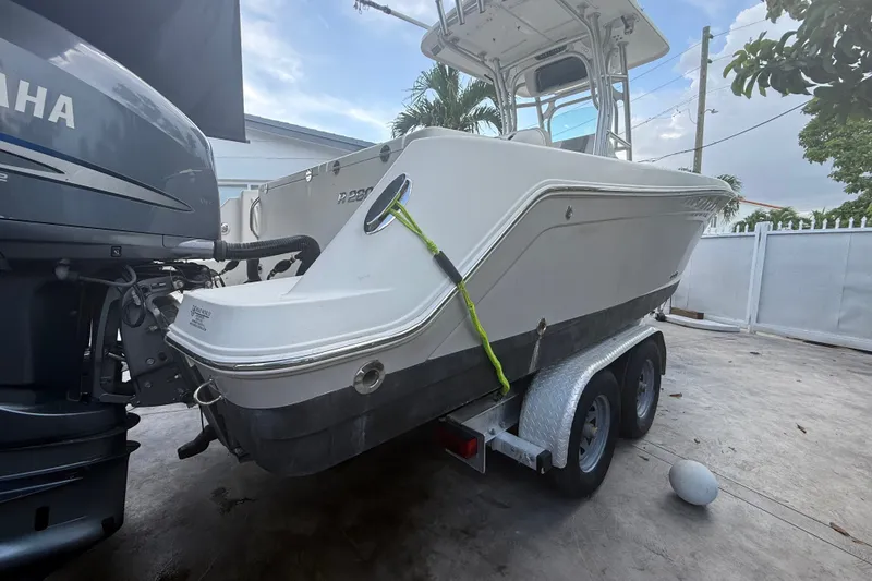 Slide: The Image of 2007 Robalo R260 Center Console boat on trailer, featuring Yamaha outboard motor. - 23