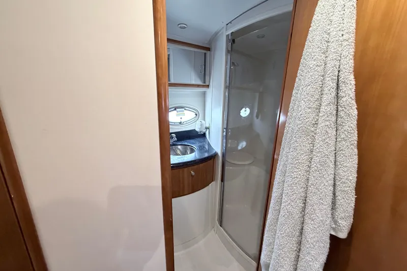 Slide: The Image of Bathroom interior of 2003 Carver 396 Motor Yacht with shower and sink. - 38