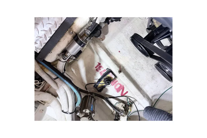 Slide: The Image of Engine room of 2003 Carver 396 Motor Yacht, showing mechanical components and wiring. - 50