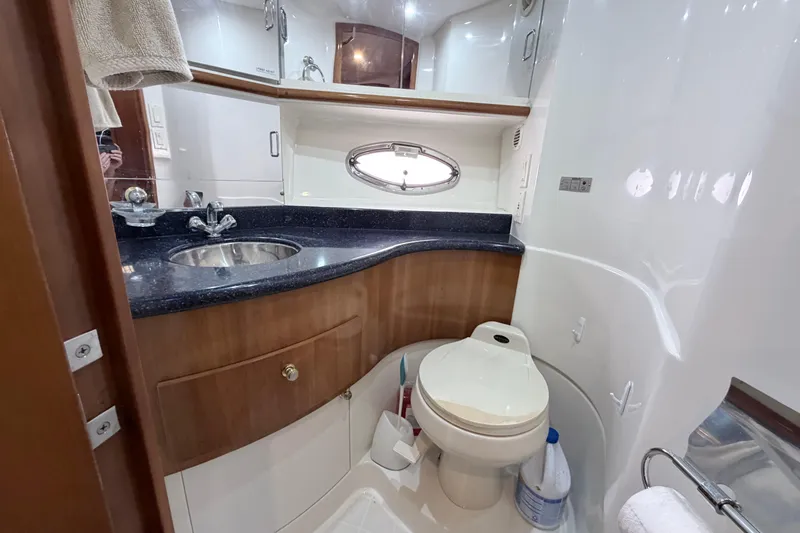Slide: The Image of Luxurious bathroom in 2003 Carver 396 Motor Yacht with modern fixtures and elegant design. - 28