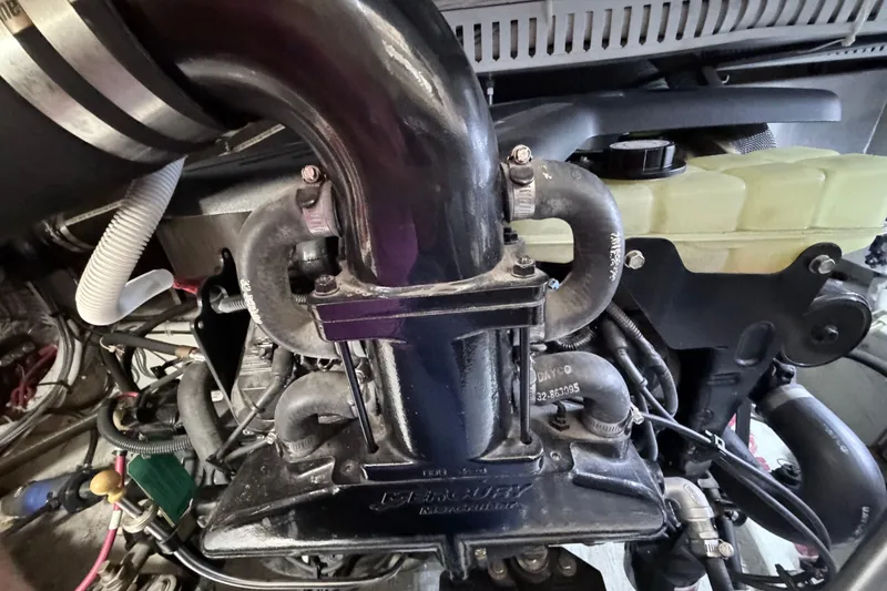 Slide: The Image of Engine compartment of a 2003 Carver 396 Motor Yacht, showcasing detailed components. - 45