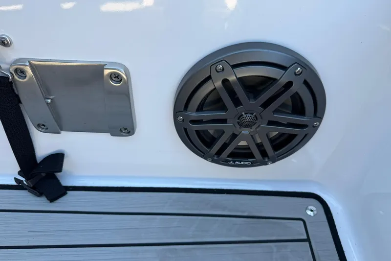 Slide: The Image of 2024 Yamaha AR190 boat speaker and deck detail with JL Audio system. - 7