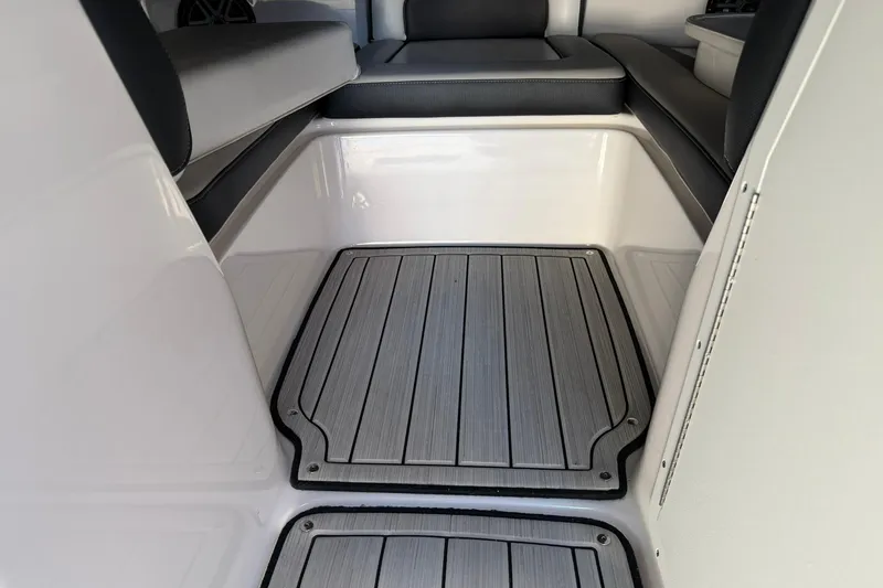 Slide: The Image of 2024 Yamaha Boats AR190 interior with cushioned seating and non-slip flooring. - 4