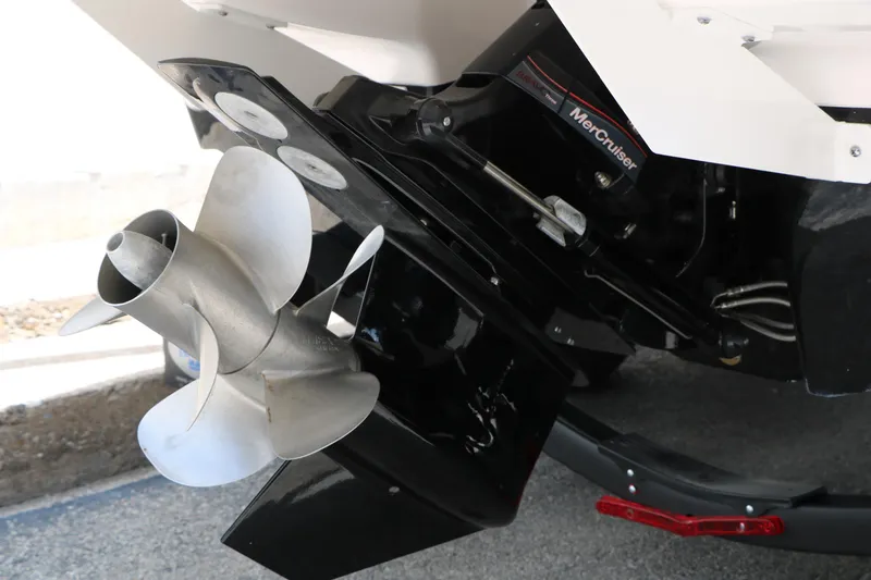 Slide: The Image of 2025 Chaparral 23 SSi boat with MerCruiser engine and stainless steel propeller. - 16