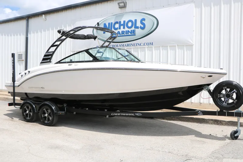 Slide: The Image of 2025 Chaparral 23 SSi boat on trailer at Nichols Marine dealership. - 4