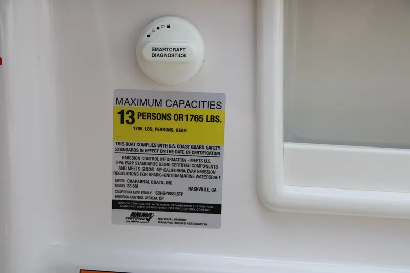 Slide: The Image of 2025 Chaparral 23 SSi boat capacity label, maximum 13 persons or 1765 lbs. - 32