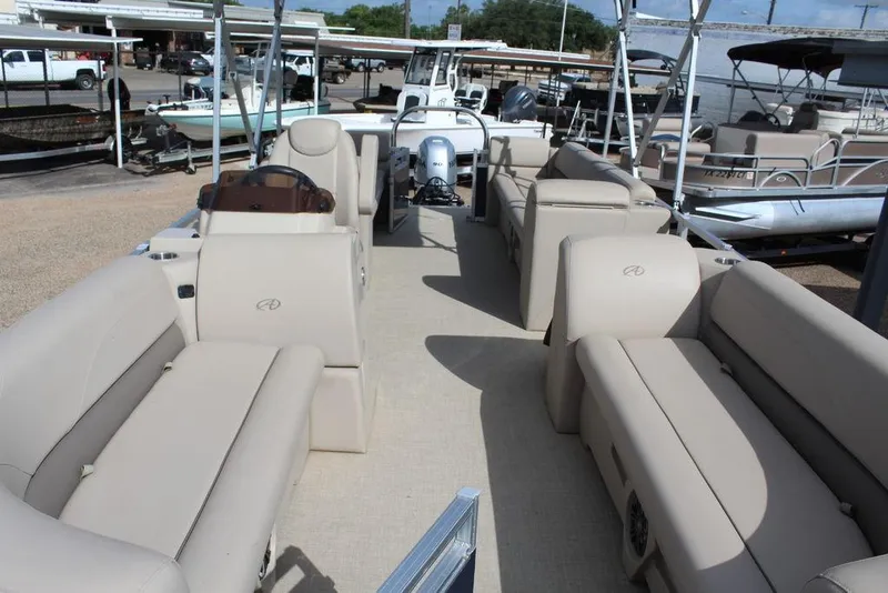 Slide: The Image of 2021 Avalon VLS Quad Lounge 22 FT pontoon boat with spacious seating and modern design. - 6