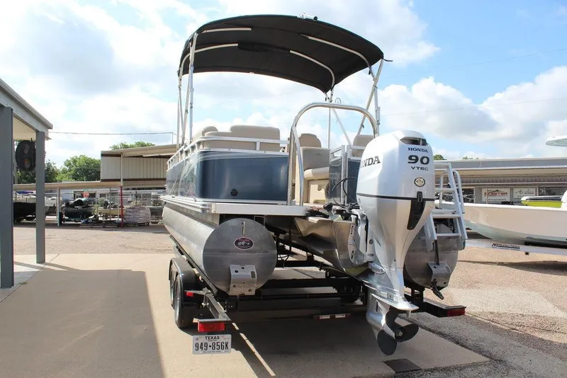 Slide: The Image of 2021 Avalon VLS Quad Lounge 22 FT pontoon boat with Honda 90 VTEC engine. - 10