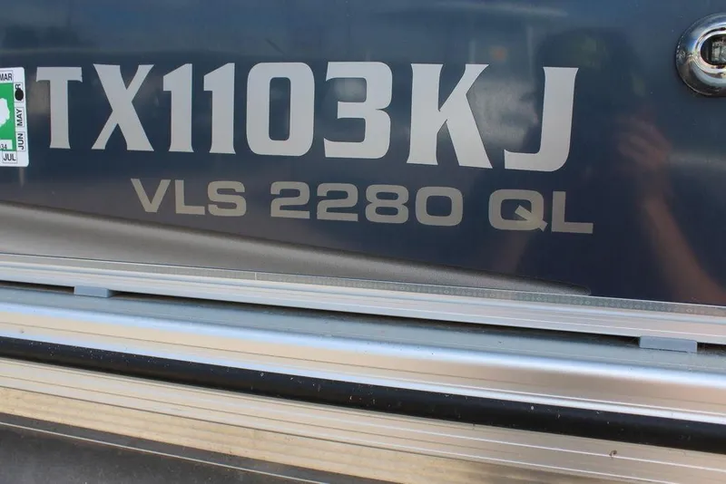 Slide: The Image of Close-up of 2021 Avalon VLS Quad Lounge 22 FT boat registration details. - 17