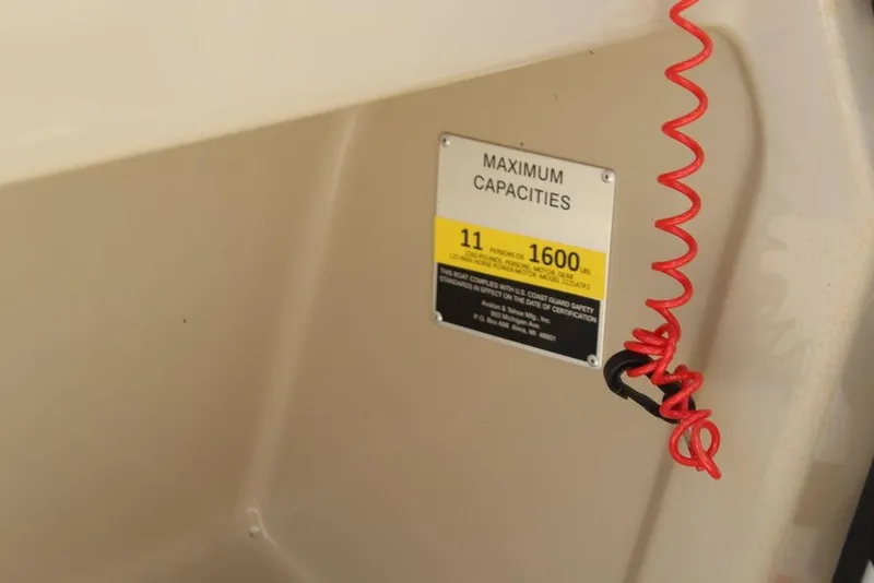 Slide: The Image of Capacity label on 2021 Avalon VLS Quad Lounge 22 FT boat, showing 11 persons or 1600 lbs. - 13