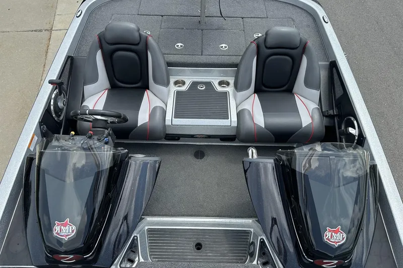 Slide: The Image of 2018 Ranger Z518 boat interior with dual seats and steering console. - 17