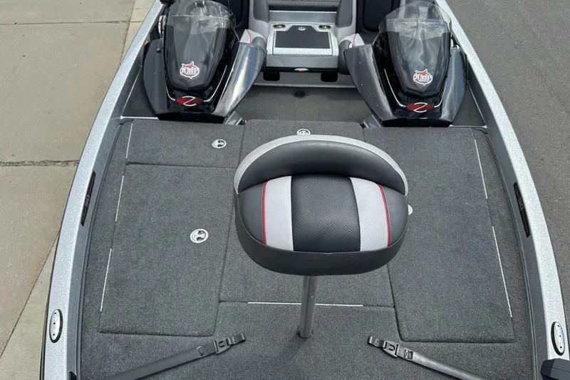 Slide: The Image of 2018 Ranger Z518 boat interior with seating and storage compartments. - 15