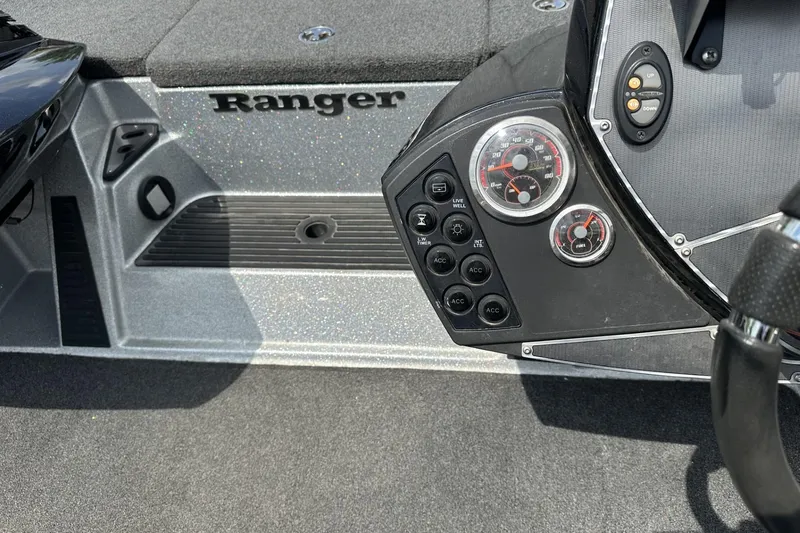 Slide: The Image of 2018 Ranger Z518 boat dashboard with gauges and control panel. - 24