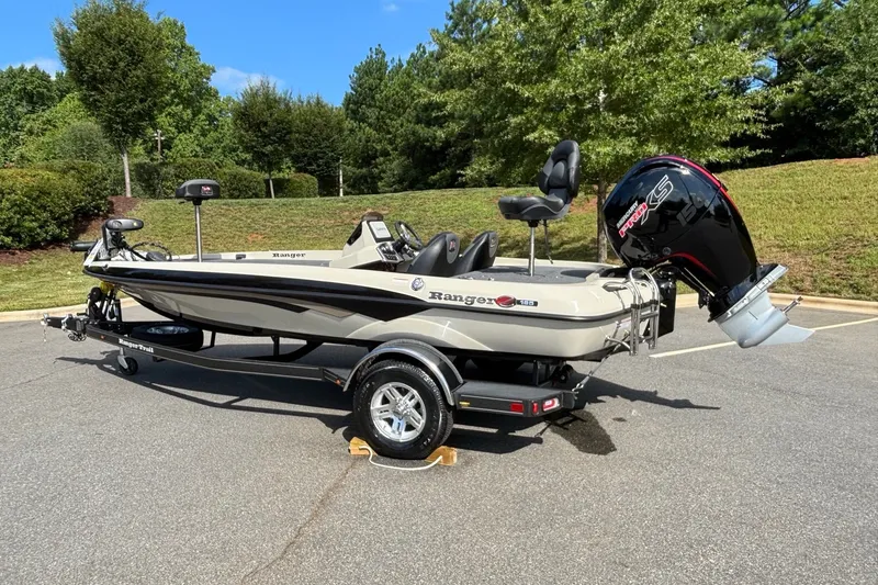 Slide: The Image of 2026 Ranger Z185 boat with trailer, parked outdoors on a sunny day. - 5