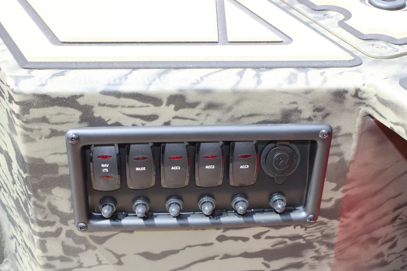 Slide: The Image of Control panel of 2026 Tracker Grizzly 1650 T Prairie Wings Edition boat. - 6