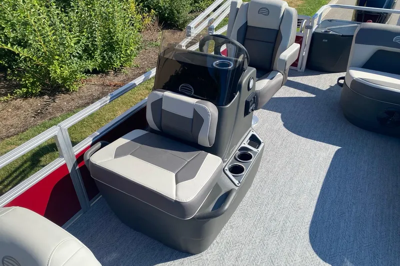 Slide: The Image of 2026 Sun Tracker Bass Buggy 18 DLX interior with comfortable seating and modern design. - 4