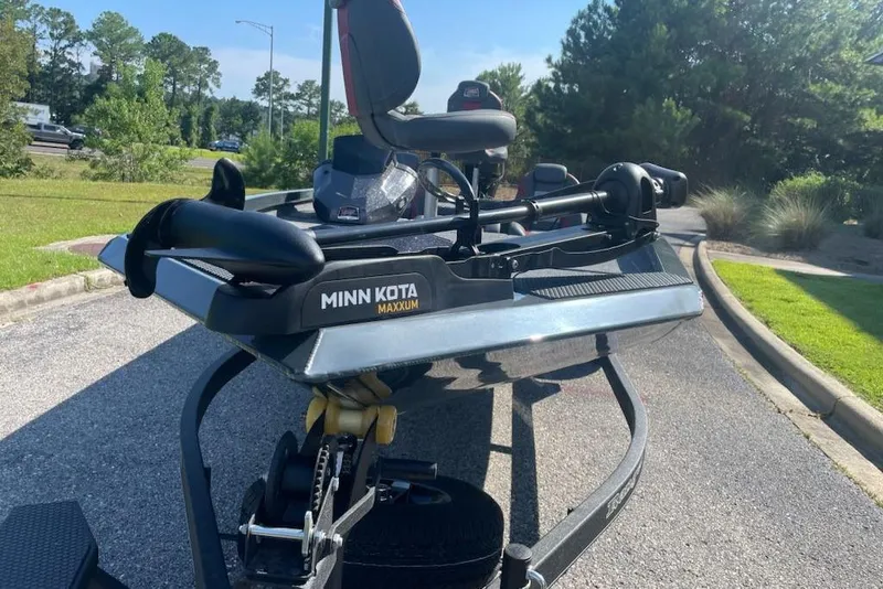 Slide: The Image of 2026 Ranger RT188P boat with Minn Kota Maxxum trolling motor on a sunny day. - 2