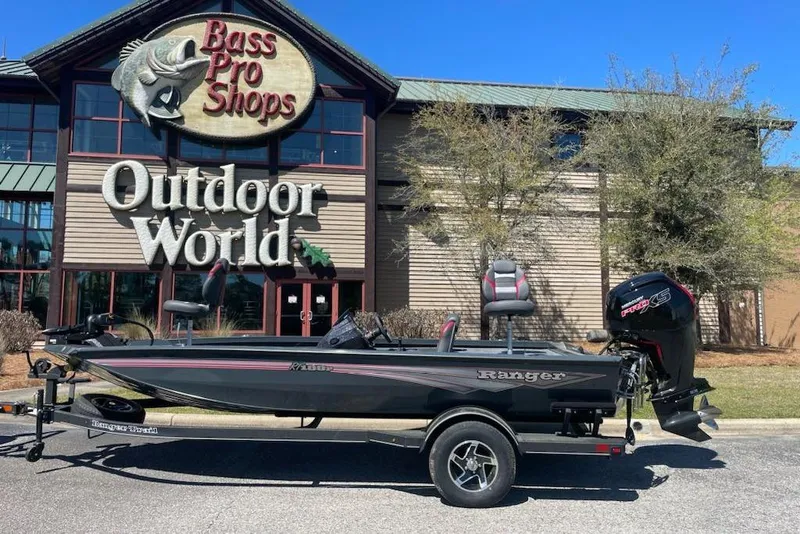 Slide: The Image of 2026 Ranger RT188P boat parked outside Bass Pro Shops Outdoor World. - 11