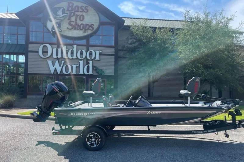 Slide: The Image of 2026 Ranger RT188P boat parked outside Bass Pro Shops Outdoor World. - 9
