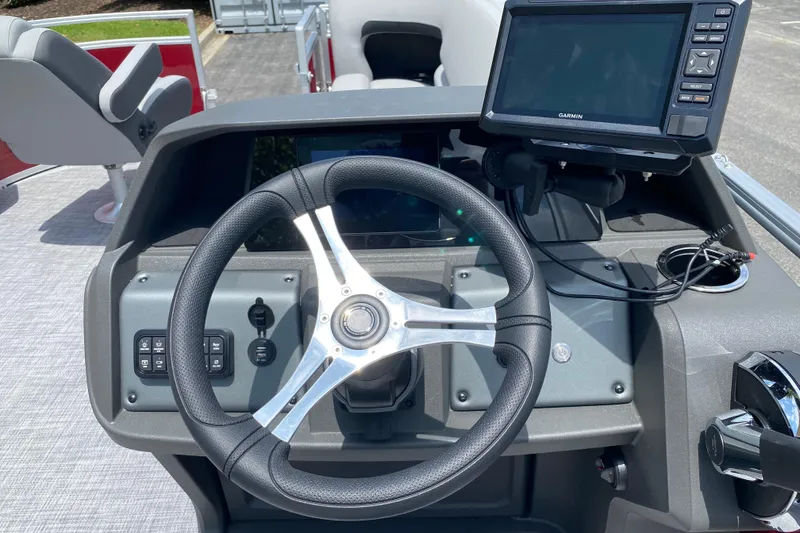 Slide: The Image of Steering console of 2026 Sun Tracker SportFish 20 DLX with Garmin navigation system. - 7