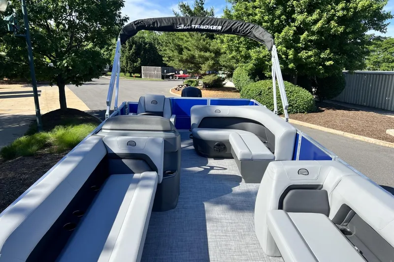 Slide: The Image of 2026 Sun Tracker Party Barge 18 DLX pontoon boat with spacious seating and canopy. - 4