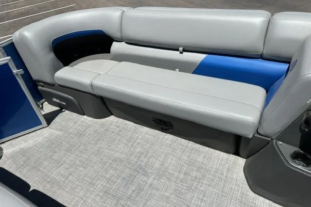Slide: The Image of 2026 Sun Tracker Party Barge 20 DLX interior with gray and blue seating. - 91