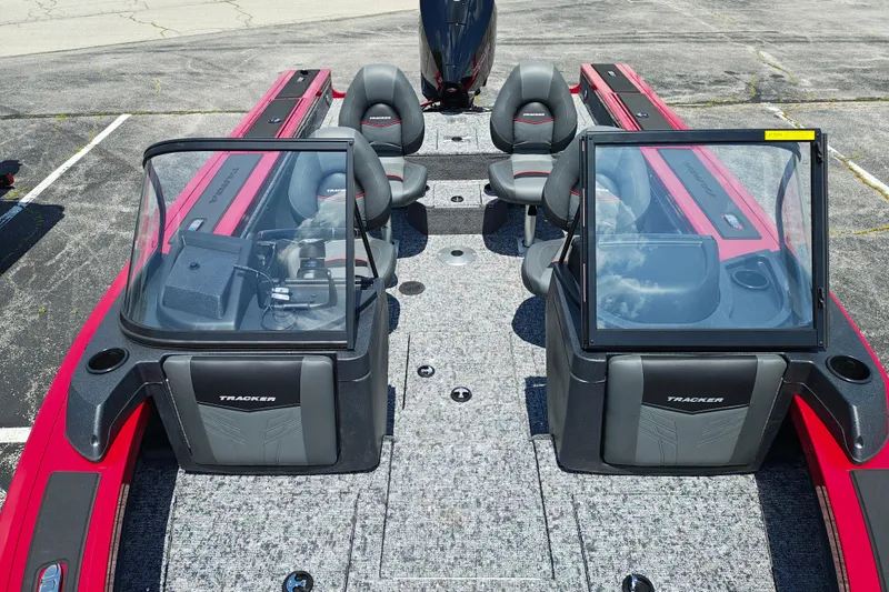 Slide: The Image of 2026 Tracker Targa V-19 WT boat interior with dual consoles and seating arrangement. - 2
