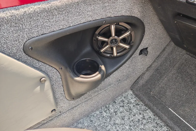 Slide: The Image of 2026 Tracker Targa V-19 WT interior speaker and cup holder detail. - 9