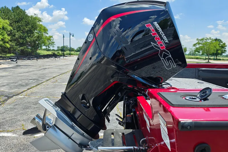 Slide: The Image of 2026 Tracker Targa V-19 WT with Mercury Pro XS engine in a sunny outdoor setting. - 20