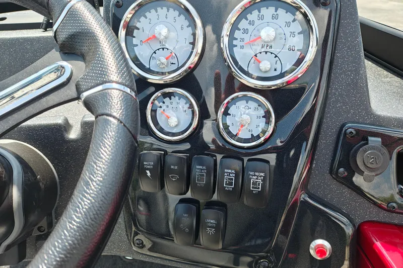 Slide: The Image of Dashboard of 2026 Tracker Targa V-19 WT boat with gauges and controls. - 13