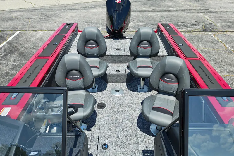 Slide: The Image of 2026 Tracker Targa V-19 WT boat interior with four gray seats and red accents. - 3