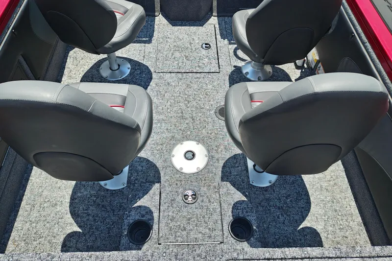 Slide: The Image of Interior of 2026 Tracker Targa V-19 WT boat with four gray seats. - 6