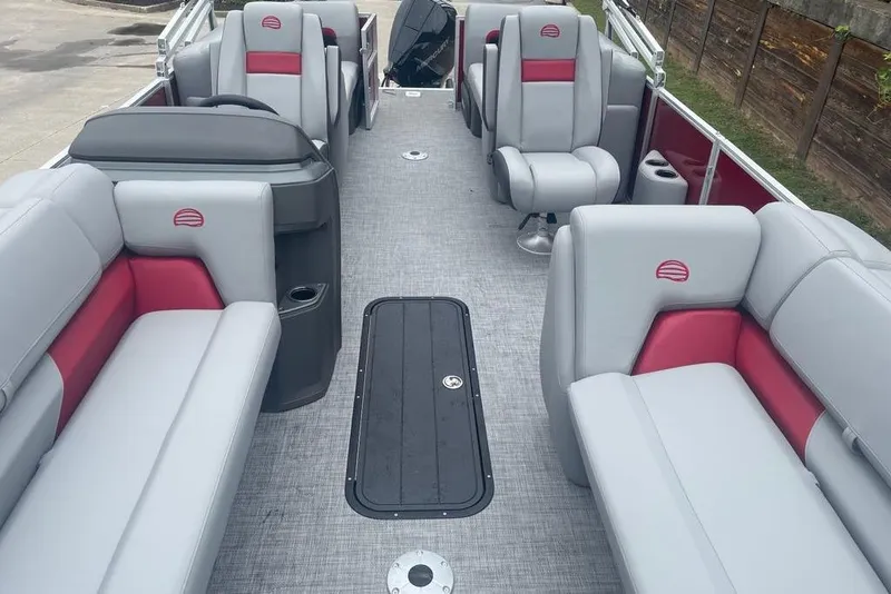 Slide: The Image of 2026 Sun Tracker Party Barge 22 XP3 interior with gray and red seating. - 4