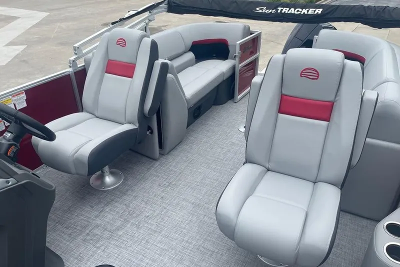 Slide: The Image of 2026 Sun Tracker Party Barge 22 XP3 interior with gray and red seating. - 3