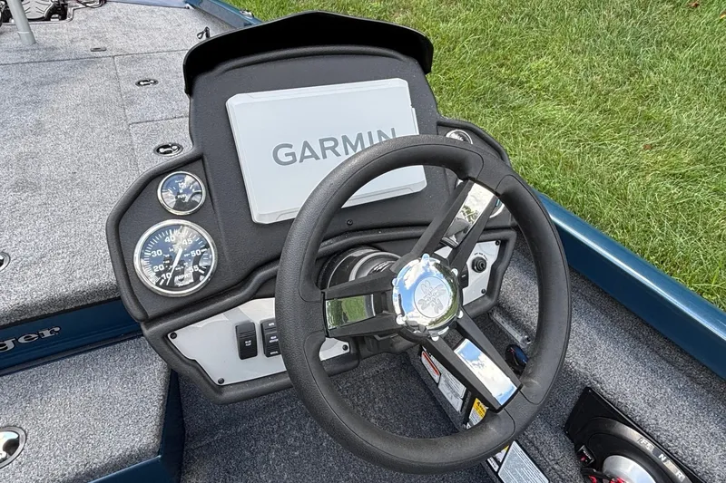 Slide: The Image of 2026 Ranger RT198P boat dashboard with Garmin display and steering wheel. - 7