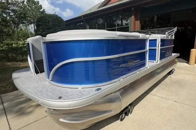 The Image of 2026 Sun Tracker Party Barge 20 DLX pontoon boat with sleek blue exterior. - 0