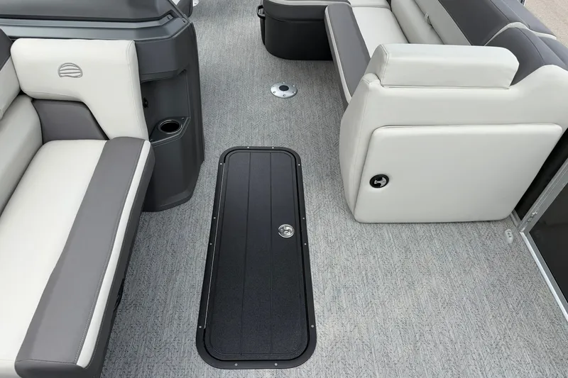 Slide: The Image of 2026 Sun Tracker Fishin' Barge 22 XP3 interior with gray and white seating. - 16
