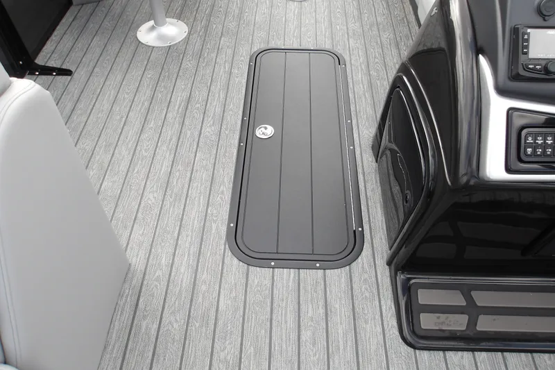 Slide: The Image of 2026 Ranger 223FC boat interior with sleek flooring and modern console design. - 26